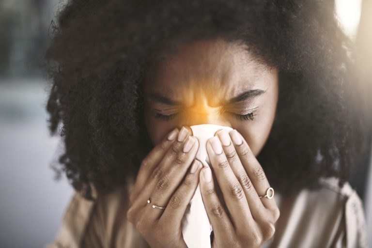 Woman with a hayfever headache