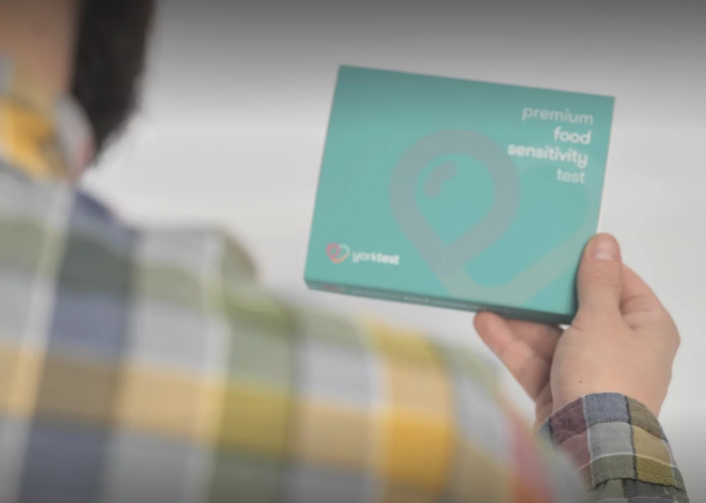 WellnessHub-Activate Man Holding Premium Food Sensitivity Test