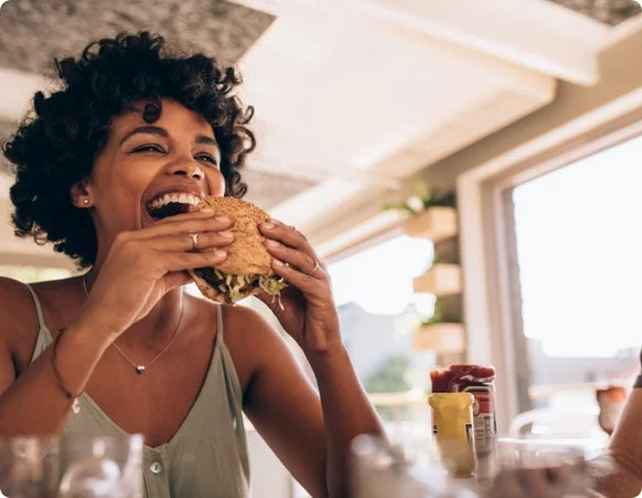 Woman eating burger