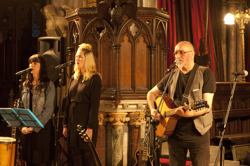 a musical band playing in a church setting