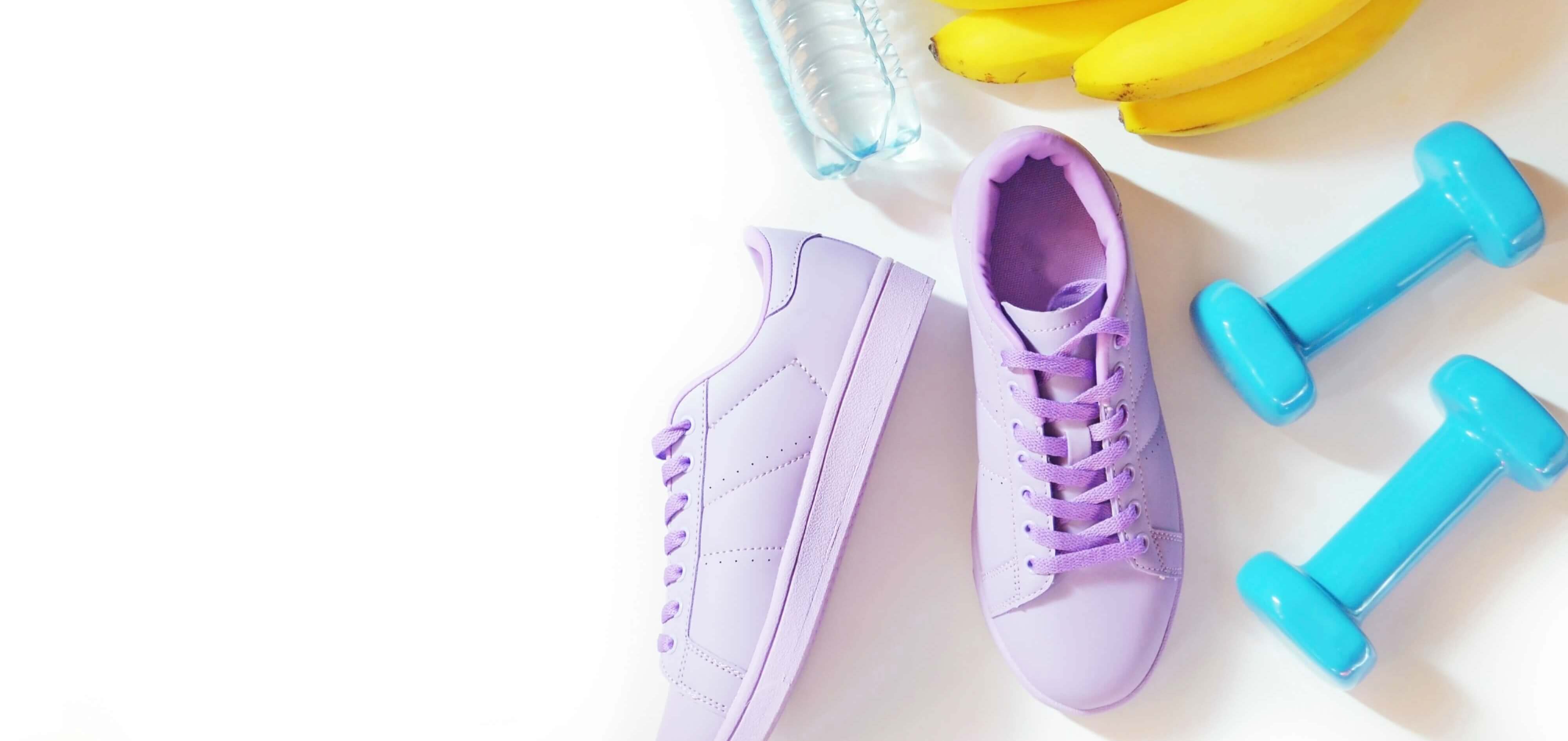 Purple trainers, blue weights, bananas & water