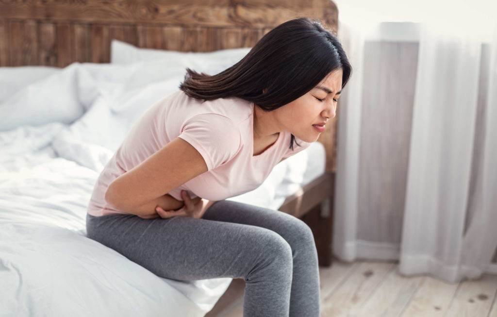 women with stomach cramps (IBS)