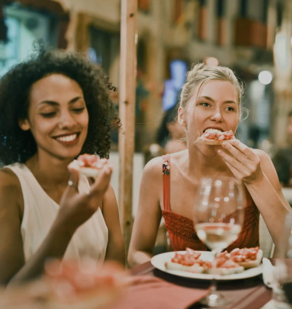two women enjoying a meal