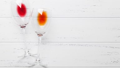 Wine glasses Wine glasses on white wooden table. Top view with space for your text